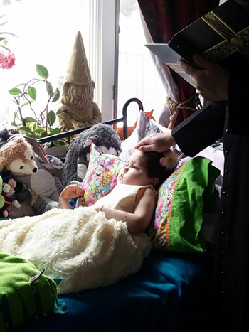 ﻿﻿﻿Six-year-old Wayne parishioner with inoperable brain tumor receives First Communion and Confirmation